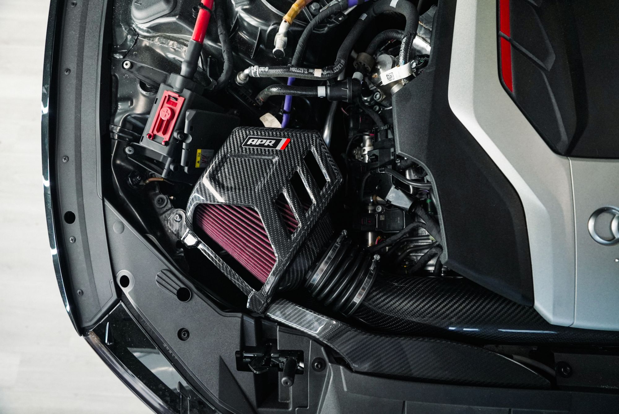APR carbon fiber cold air intake installed on a vehicle at SB Auto Studio